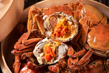 Fresh and delicious hairy crab or chinese mitten crab with crab roe background