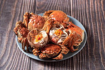 Fresh and delicious hairy crab or chinese mitten crab with crab roe on table