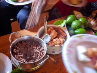 baked beans, cassava and avocado on a table