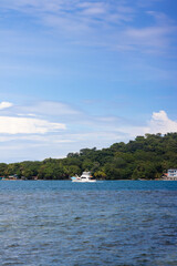 Beautiful Isla Grande beach in Colon, Panama, sky and blue sea