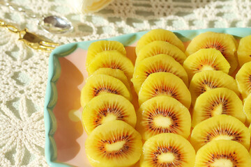 red kiwi fruit on a plate