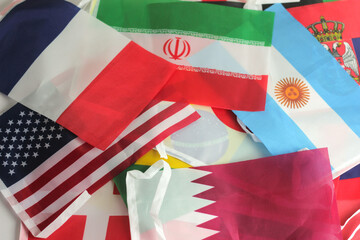 Leather soccer ball with international team flags of the participating countries in the...