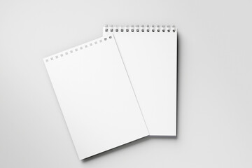 Blank white vertical ringed invoice or notebook mockup. 3d rendering