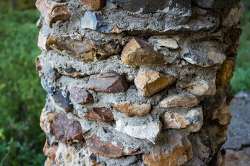 Fragment of a column made of river flint pebbles