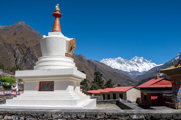 Tibetan Buddhism stupa in Tengboche monastery with beautiful view of Mt.Everest and Mt.Lhotse in the background.