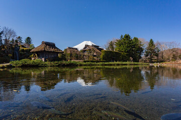 Sunny view of traditional building with MT. Fuji