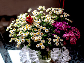 bouquet with small chrysanthemums and a rose