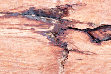 Stains on old wooden wall caused by splashing rain