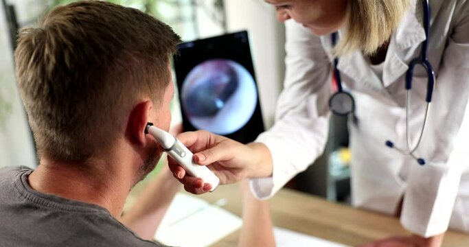 Adult male during ear examination at hearing clinic