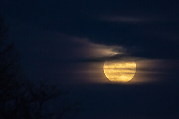 Full moon with clouds at night