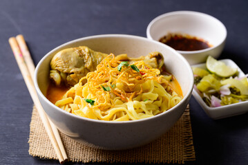 Northern Thai food (Khao Soi), Spicy curry noodles soup with chicken, Local Thai food