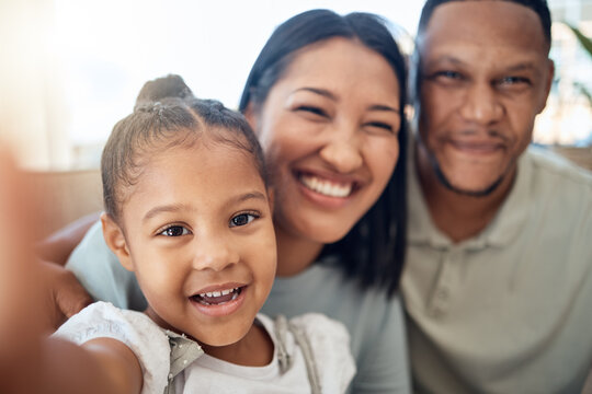 Mother, father and child take a selfie as a happy family relaxing on a peaceful and calm weekend together. Portrait, mom and dad enjoy bonding and taking pictures with a young girl or child at home