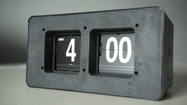 Flip clock shows it's 4 a.m. time