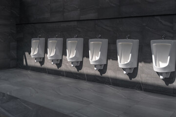 A row of white ceramic urinal chamber pot interior design with beautiful grey marble floor and wall...
