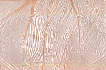 orange plastic sheet material surface