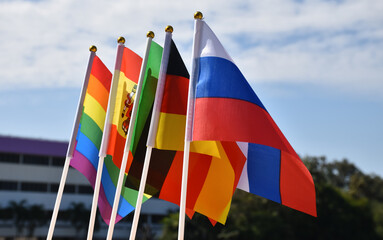 Rainbow flag and National flags of China, soft and selective focus, concept for LGBT celebration and respecting gender diversity of human in China and around the world.