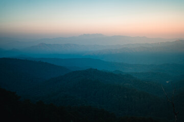 Scenic View Of Mountains During Sunset