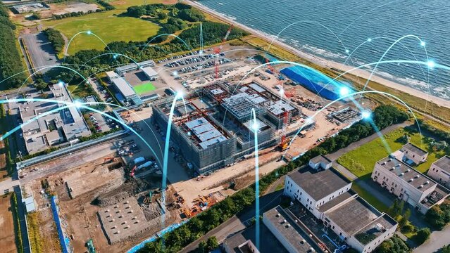 Modern construction site and wireless communication network concept. Smart factory. Industrial Internet of Things. IIoT.