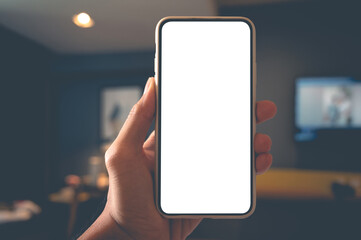Close up men using a smartphone with an empty white screen at home.
