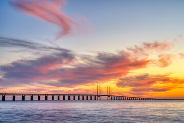 The famous Oresund bridge between Denmark and Sweden after a spectacular sunset