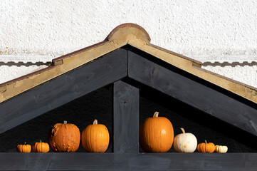 Pumpkin display in the gable of a house for Halloween 
