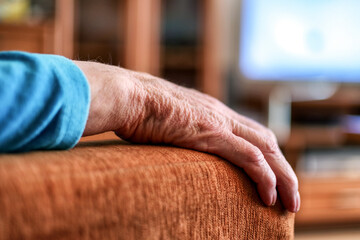 Wrinkled hand of senior woman