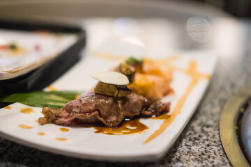 Sushi premium grilled beef on white tray. Japanese premium food.