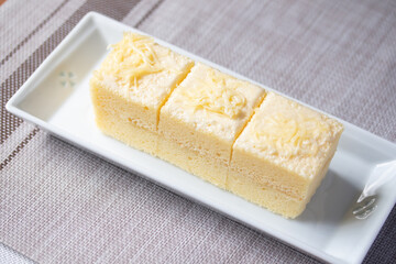 Vanilla cream cake in white plate