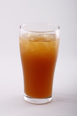 Single glass of iced tea on a white background