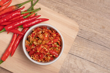 Freshly ground red chilies in a white cup