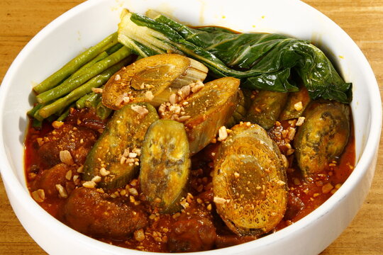 Kare-kare, a filipino dish of ox tripe, assorted vegetables and peanut sauce