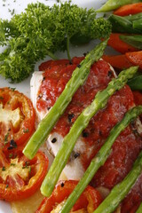 Closeup of a healthy chicken meal with various vegetables