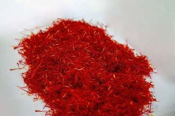 Saffron threads pile, close up, above view. Crocus stamen