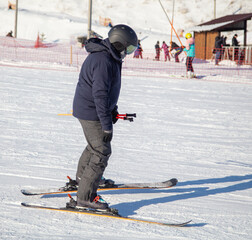 A man is skiing in the snow.