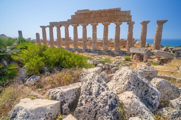 Ruins of a Greek temple in the archaeological park of Selinunte in Sicily in Italy. - Powered by Adobe