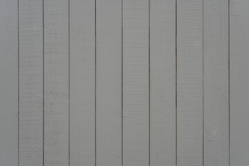 Wooden painted bars. Grey pine slats on wall, decorative border. Texture of grey wood boards vertical. Painted wood background - obrazy, fototapety, plakaty