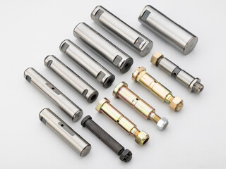 precision-machined metal spring pins for use in automobile applications