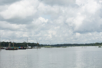 September 12 2020, Babuganj, Barisal, Bangladesh.Small fishing boats are floating in the river