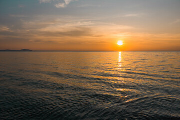 Fototapeta premium Natural Sunset Sunrise over the ocean. Beach vibe.