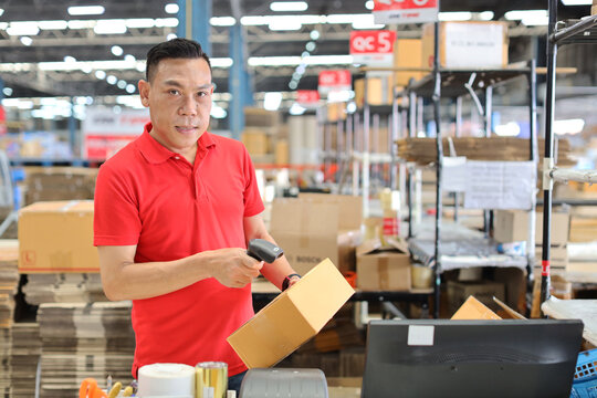 Warehouse workers man using computer, walkie talkie radio and cardboard for controlling stock and payment in retail warehouse logistics, distribution center