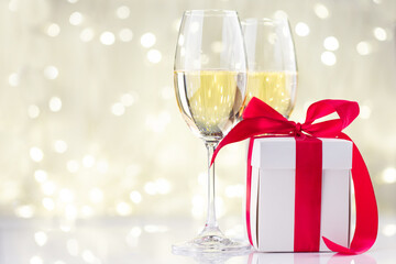 Champagne glasses and gift