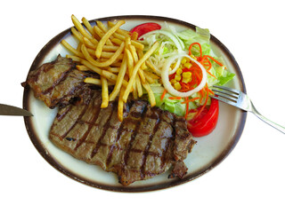 Grilled meat, french fries and salad on white plate isolated