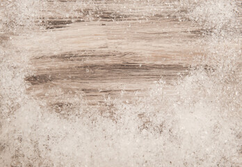 Wooden gray background with artificial snow