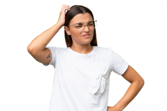 Young caucasian woman isolated on green chroma background having doubts while scratching head - Powered by Adobe