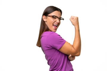 Young caucasian woman isolated on green chroma background celebrating a victory