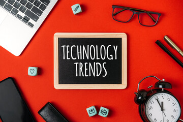 Technology Trends, Tech trends, Top New Technology. Word trends with different gadgets and devices on red background.