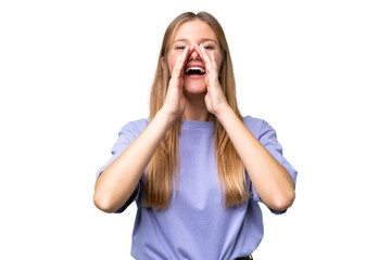 Fototapeta premium Young beautiful woman over isolated background shouting and announcing something