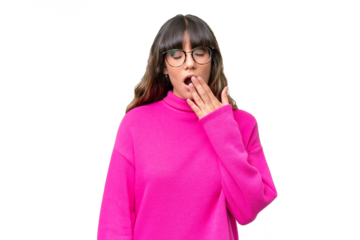 Young caucasian woman over isolated background yawning and covering wide open mouth with hand