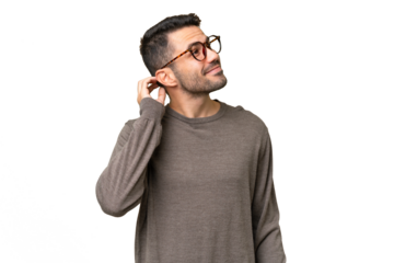 Young handsome caucasian man over isolated background thinking an idea