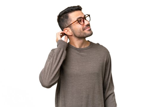 Young handsome caucasian man over isolated background thinking an idea